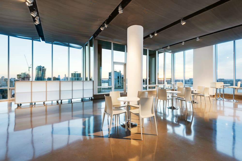 Sleek Flexible Venue with Rooftop Terrace in Midtown with Natural Light and White Decor