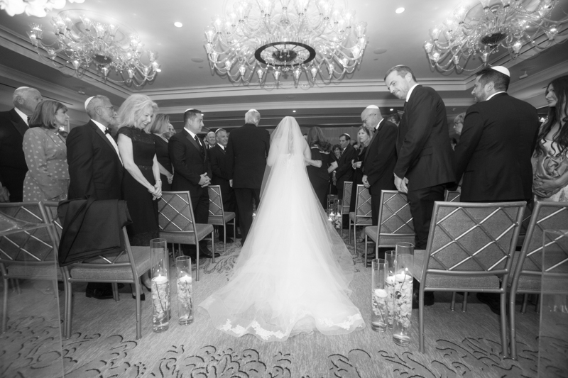 The bride and her father walking down the aisle